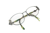 SILHOUETTE with wings oval metal frame, ladies womens eyewear // gray satin & see water acetate // vintage 1970s