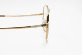 Rare and unique Yves Saint Laurent Paris mod. Hyre eyeglasses frame oval drop lenses, Golden main colour with White & Black details, NOS 70s