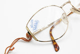Safilo Elasta vintage 1980s eyeglasses womens ladies, intense golden colour with yellow holes , New Old Stock
