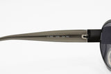 Les Copains sunglasses mod. LC 305 Size 53, Oval sunglasses darken gunmetal frame, New Old Stock 1990s
