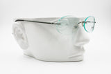 VERSACE VERSUS C21 Rimless eyeglass frame, graphite color, New Old Stock 1990s