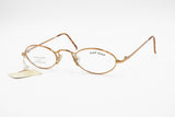 Vintage high rank NAF NAF made in France frame eyeglasses, little oval with designer nose bridge, reflective intense Bronze colour, NOS